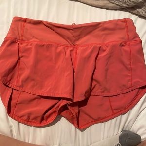 Lululemon speed-ups size 4, 2.5 inch, rare color in coral.